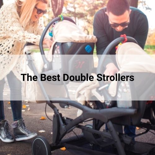 Mom and dad with twins on a double stroller