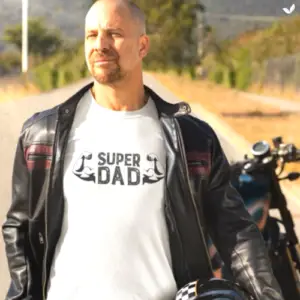 rider father flexing his super dad shirt