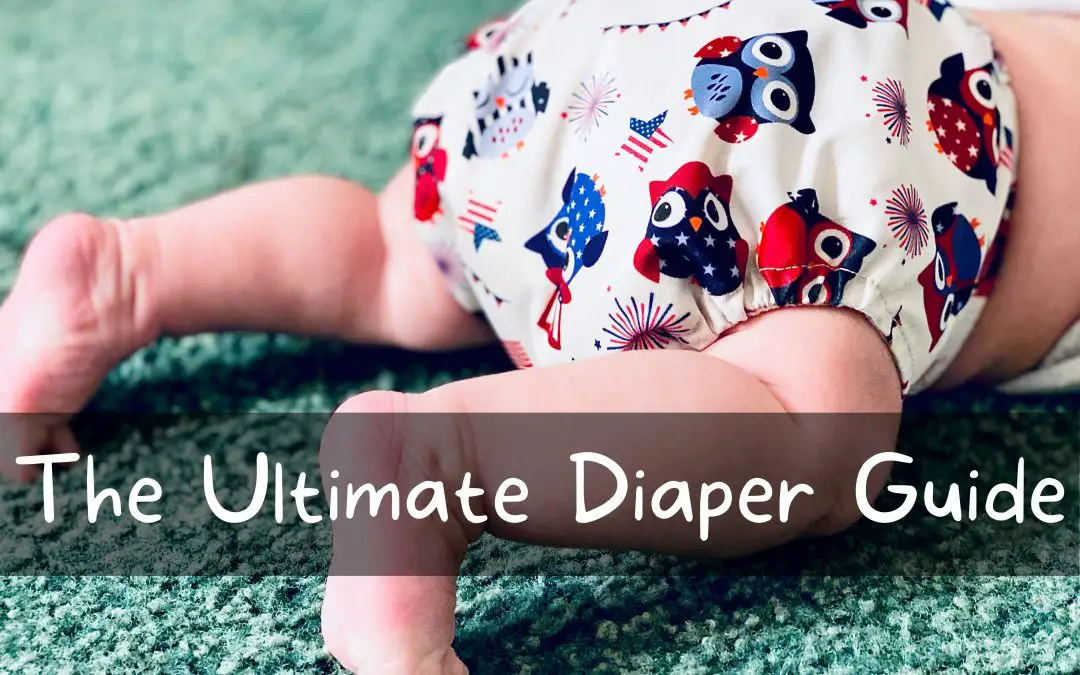 Baby wearing a cloth diaper with owl design